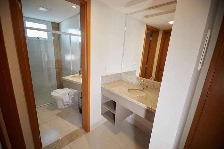 Apartamento Resort do Lago com roupas cama e banho