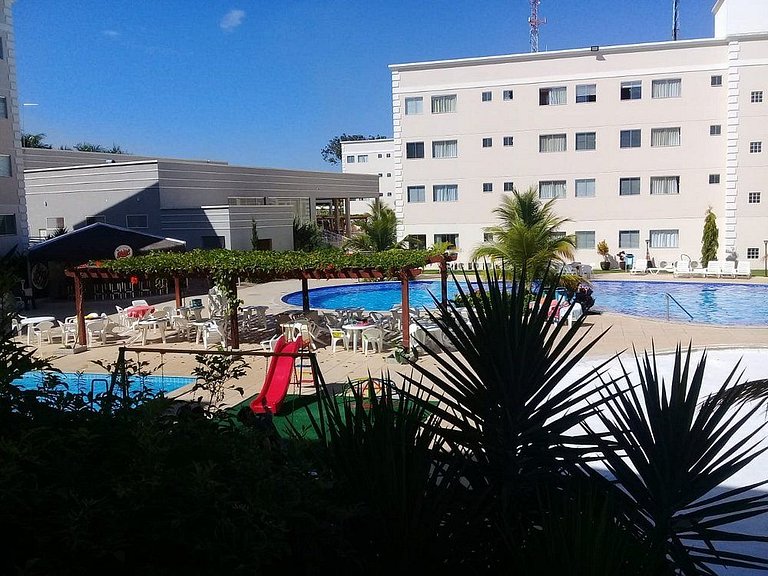 Apartamento Encontro das Águas com roupas de cama