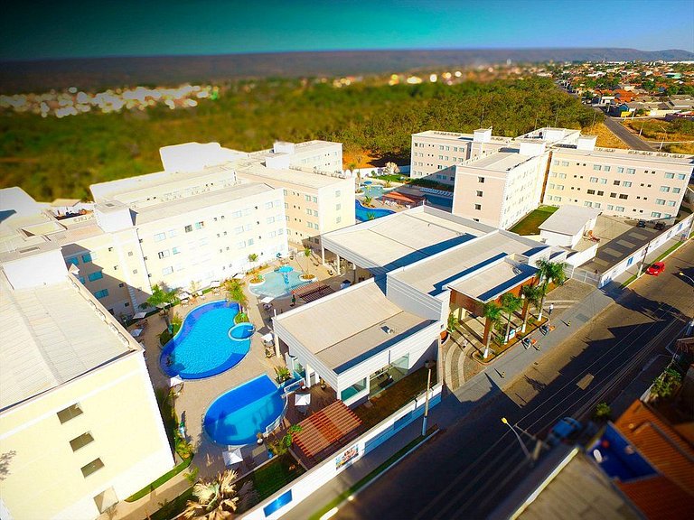 Apartamentos Encontro das Águas com roupas de cama