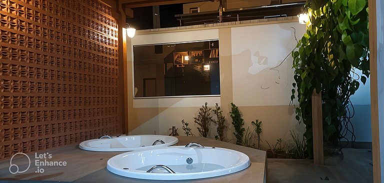 Apartamento Encontro das Águas com roupas de cama