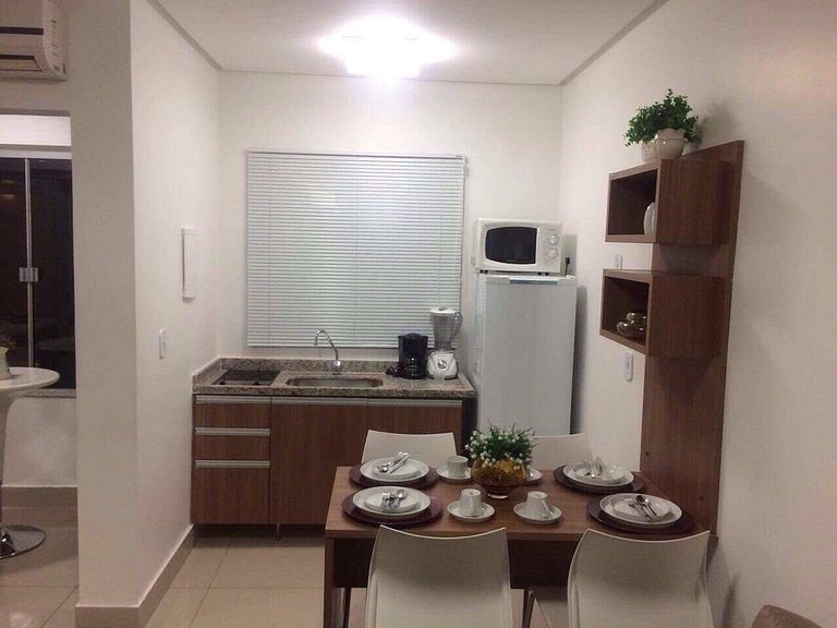 Apartamentos Encontro das Águas com roupas de cama