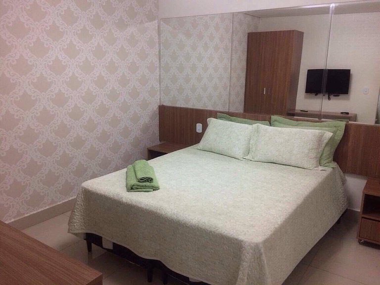 Apartamentos Encontro das Águas com roupas de cama